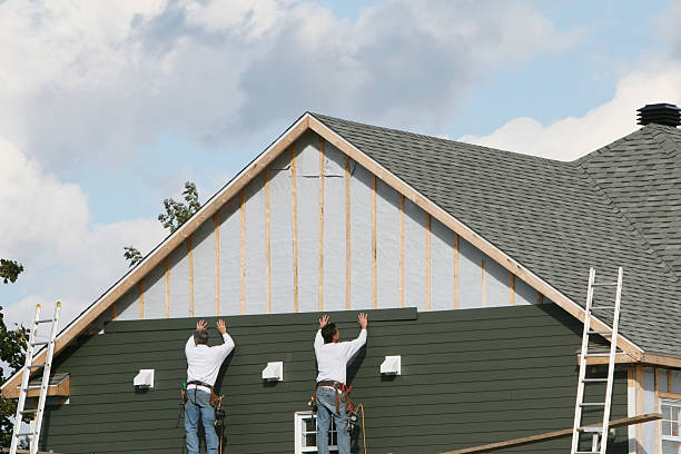 Professional Storm Damage Siding Repair technician working in Mount Pleasant, TX